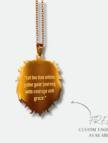 Front view of a gold-plated lion pendant necklace with detailed lion's head design. Back view of a gold-plated lion pendant necklace with custom engraving "Let the lion within guide your journey with courage and grace."