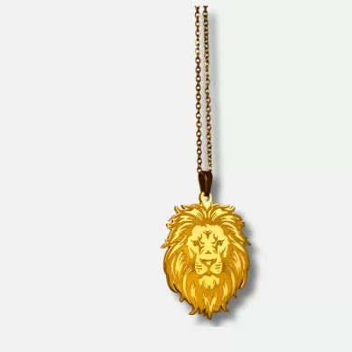 Front view of a gold-plated lion pendant necklace with detailed lion's head design. Back view of a gold-plated lion pendant necklace with custom engraving "Let the lion within guide your journey with courage and grace."