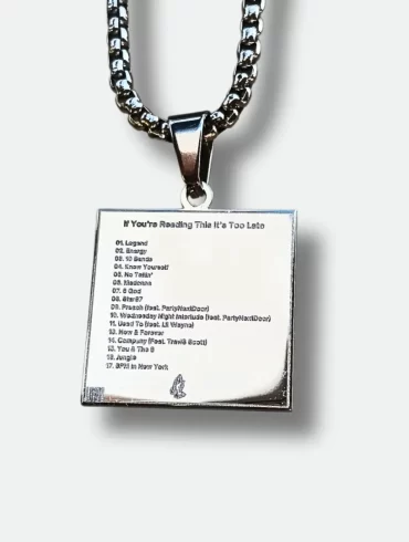 Front view of silver pendant featuring Drake's "If You're Reading This It's Too Late" album cover and back view with engraved tracklist