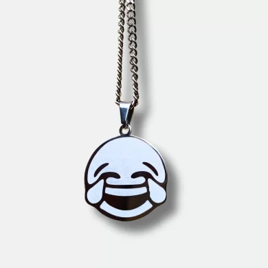 A custom-engraved funny pendant featuring a crying laughing emoji on the front.